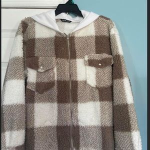 This is a large jacket fits more like a medium